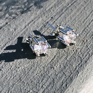 CZ. Six Claw Stud Earrings